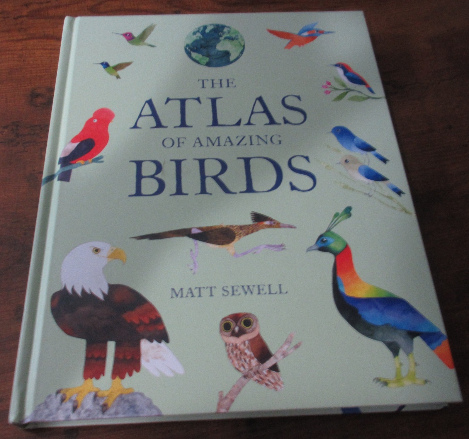 “The Atlas of Amazing Birds” by Matt Sewell – hardcover